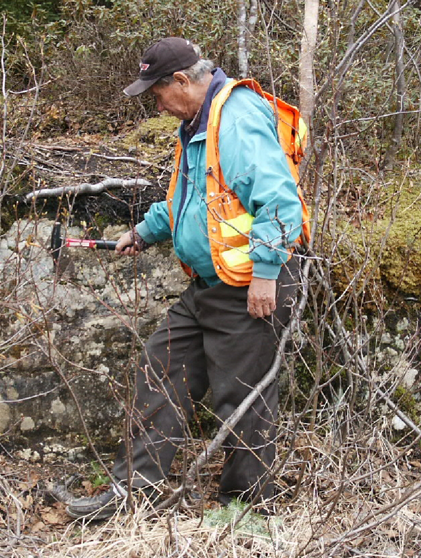 Henry Salt, Cree prospector, working in the field
